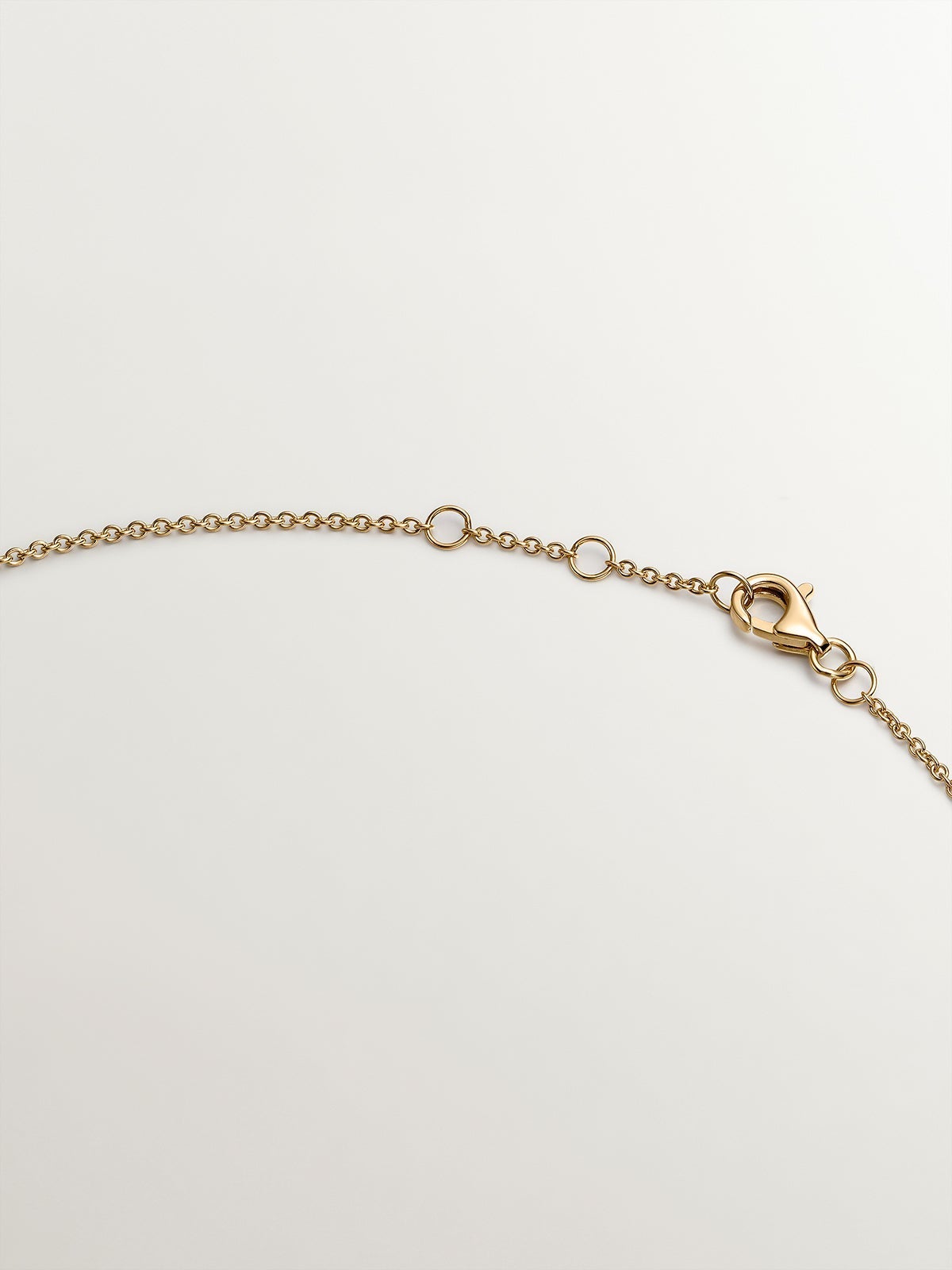 Colgante de oro amarillo de 18K con diamante de 0,1 cts