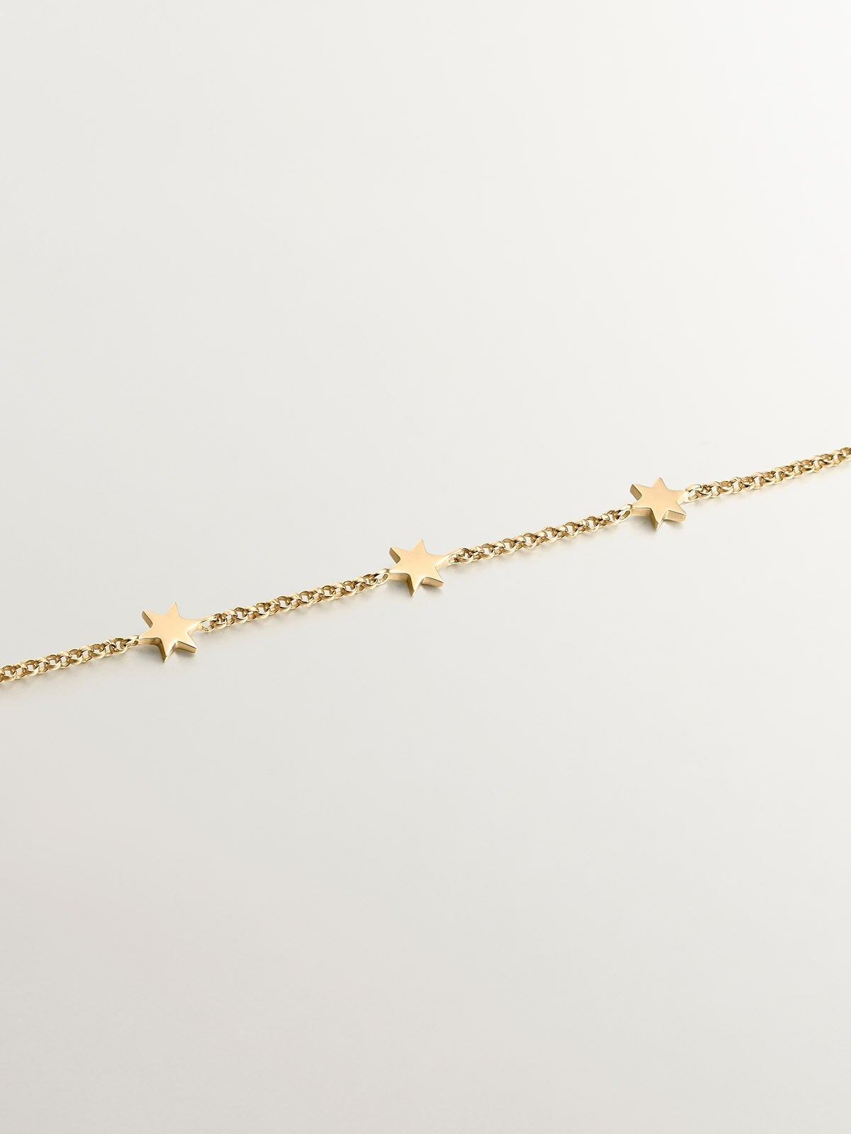 Pulsera de oro amarillo de 9K con estrellas