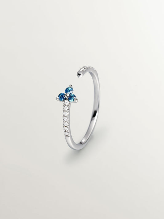 Anillo de oro blanco de 9K con diamantes y trébol de zafiros azules