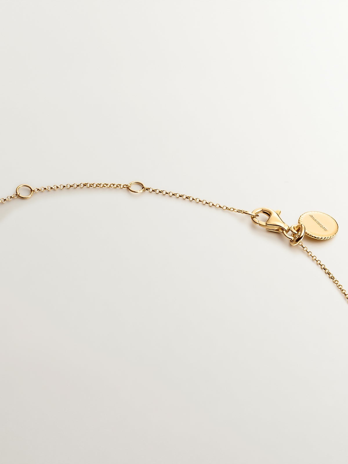 Colgante de plata 925 bañada en oro amarillo de 18K con topacio azul sky