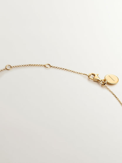 Colgante de plata 925 bañada en oro amarillo de 18K con topacio azul sky