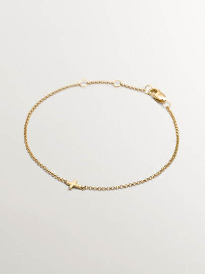 Pulsera de oro amarillo de 9K con cruz
