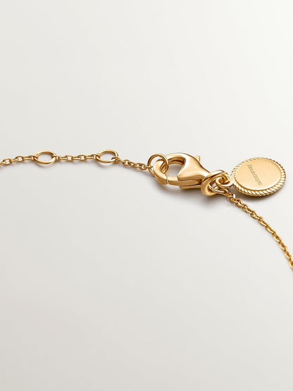 Pulsera de plata 925 bañada en oro amarillo de 18K con topacios azul swiss y blanco