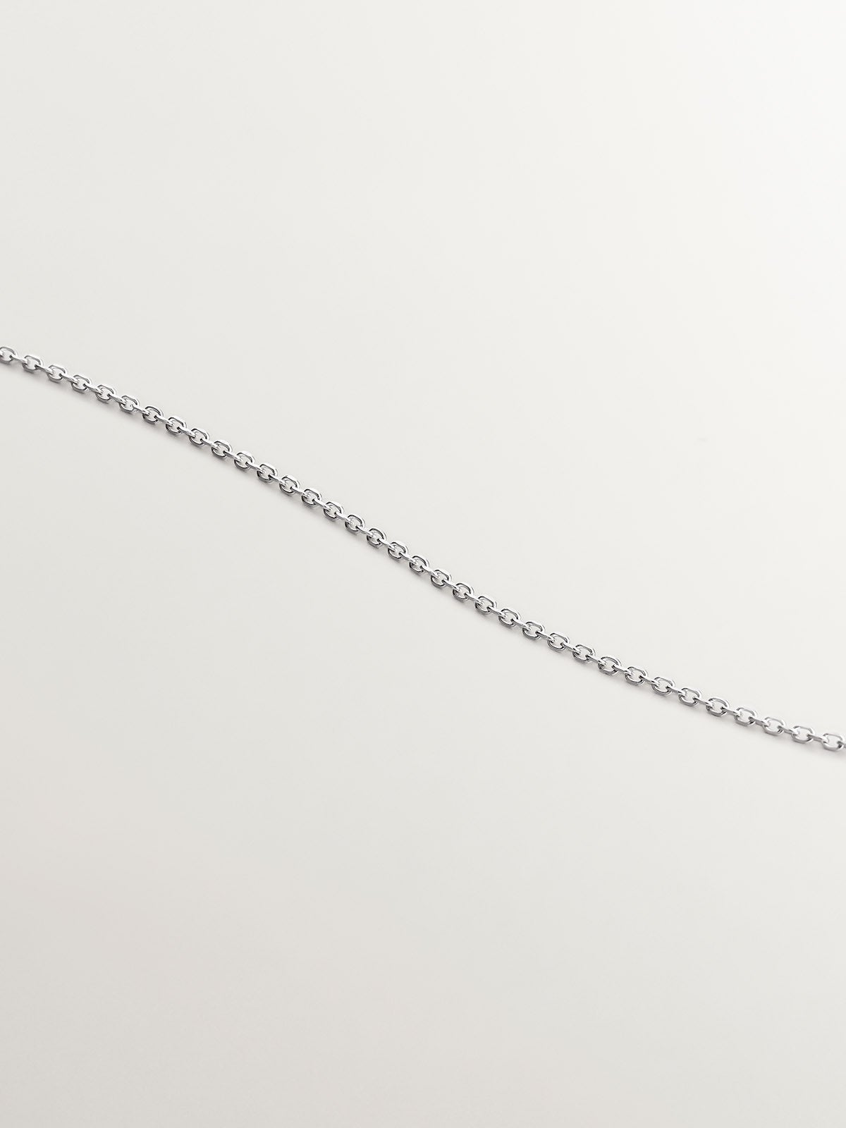 Colgante de oro blanco de 18K con estrella de diamantes