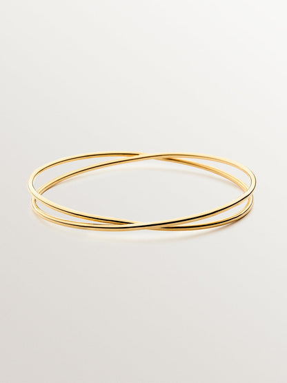 Pulsera rígida estilo semanario de plata 925 bañada en oro amarillo de 18K.