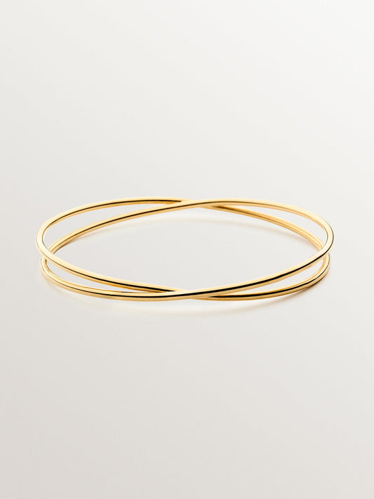 Pulsera rígida estilo semanario de plata 925 bañada en oro amarillo de 18K.