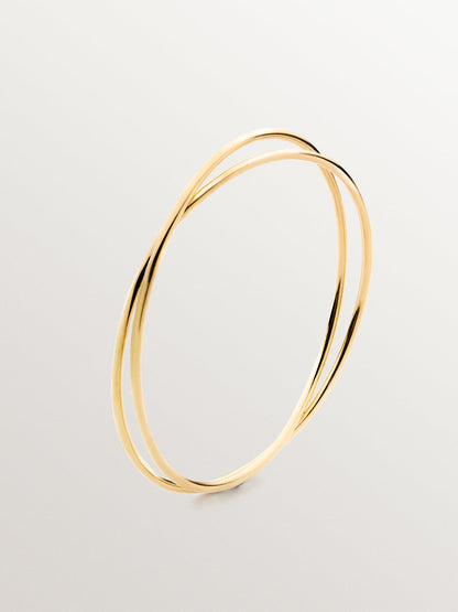 Pulsera rígida estilo semanario de plata 925 bañada en oro amarillo de 18K.