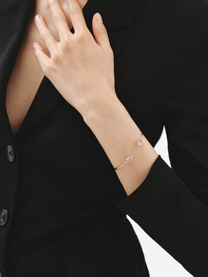Pulsera abierta de oro amarillo de 9K con amatistas rosas y diamantes