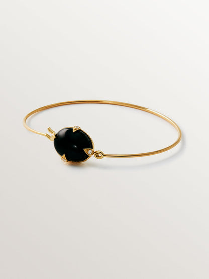 Pulsera de oro amarillo de 18K con ónix negro y diamantes en talla brillante