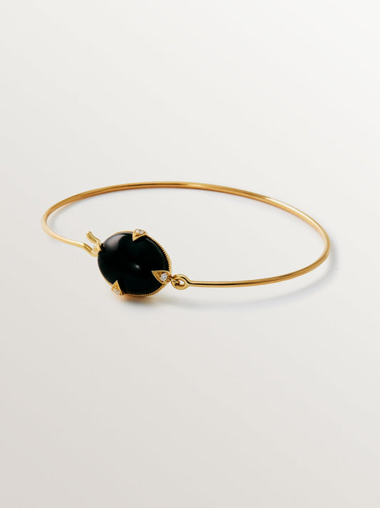 Pulsera de oro amarillo de 18K con ónix negro y diamantes en talla brillante