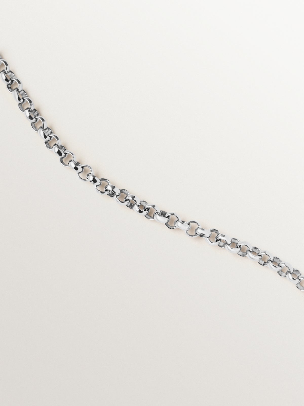 Colgante trenzado de plata 925 bañada en rodio y oro amarillo de 18K con pavé de topacios blancos